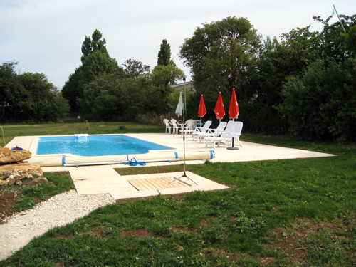 Landscaping around swimming pool and gites in France